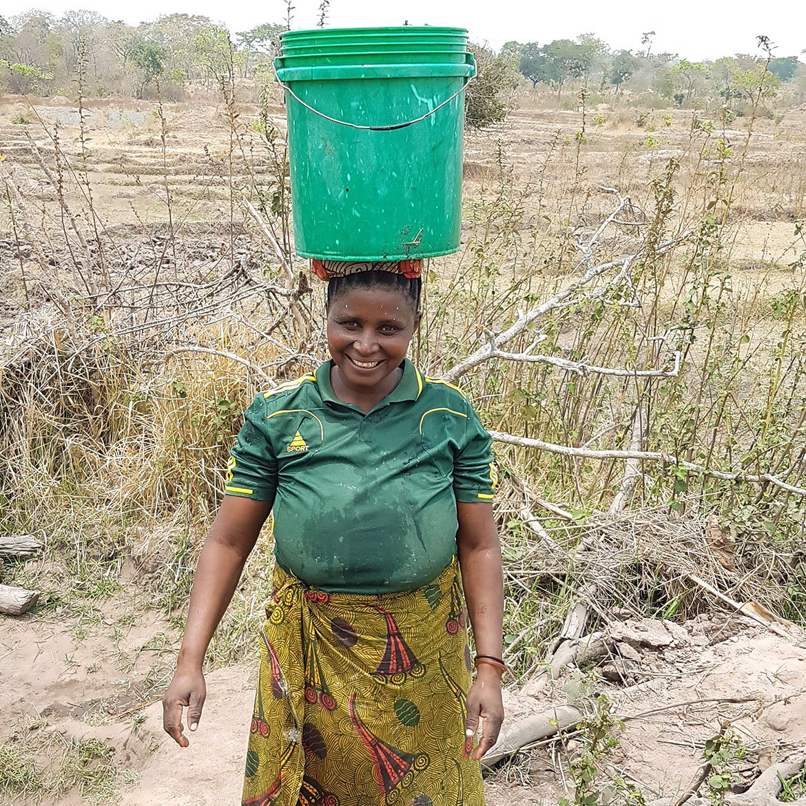 a05-woman-carrying-bucket-of-water-on-head